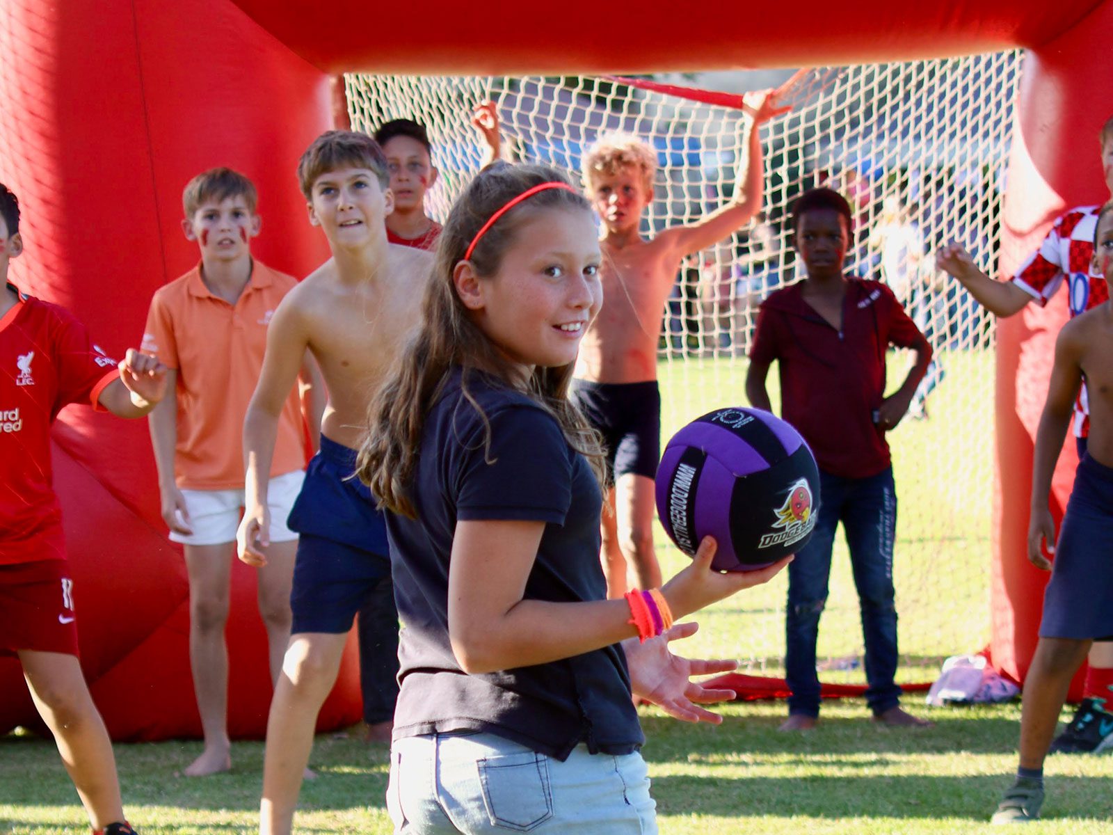 Kids celebrating after a dodgeball match